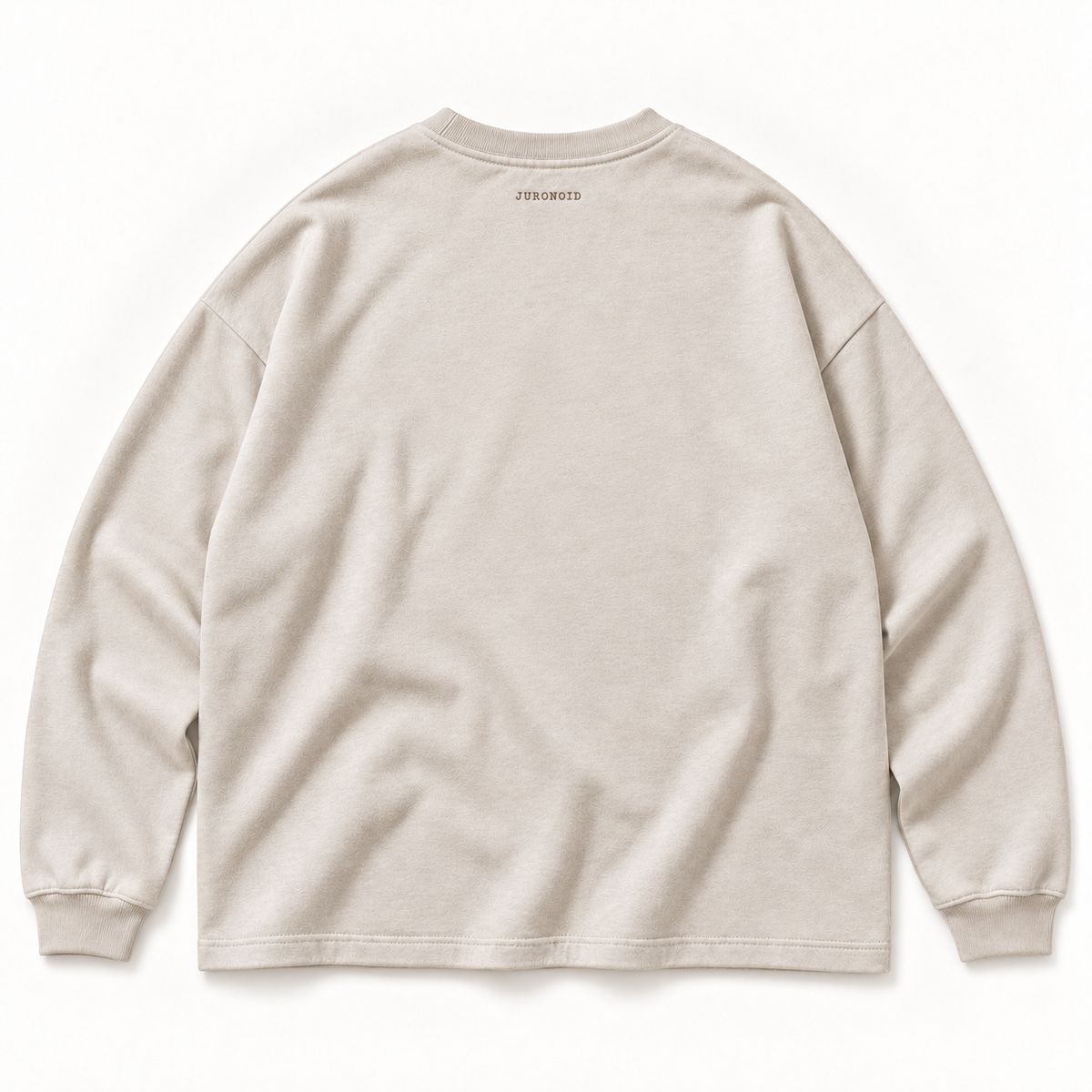 Beiges JURONOID Handle With Care Longsleeve von hinten mit dezentem braunem JURONOID-Nackenstick